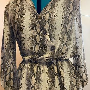 Peplum snake skin long sleeve top